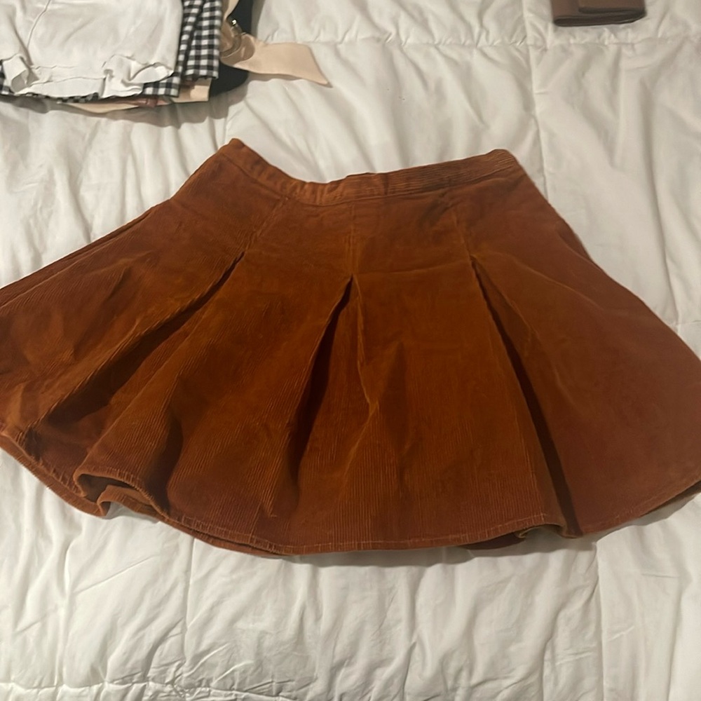 Pleated mini skirt. Burnt orange. Material Corduroy. Size 9